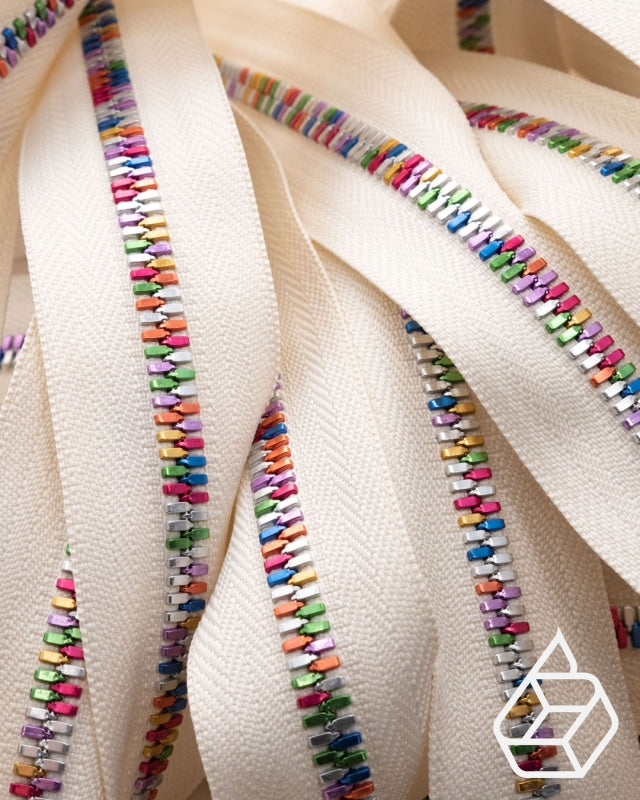 Excella® Light | Rainbow colored YKK zipper on a roll